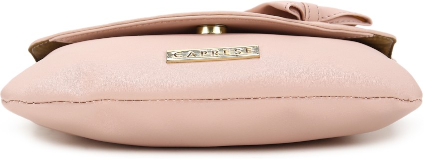 Caprese pink solid sale sling bag