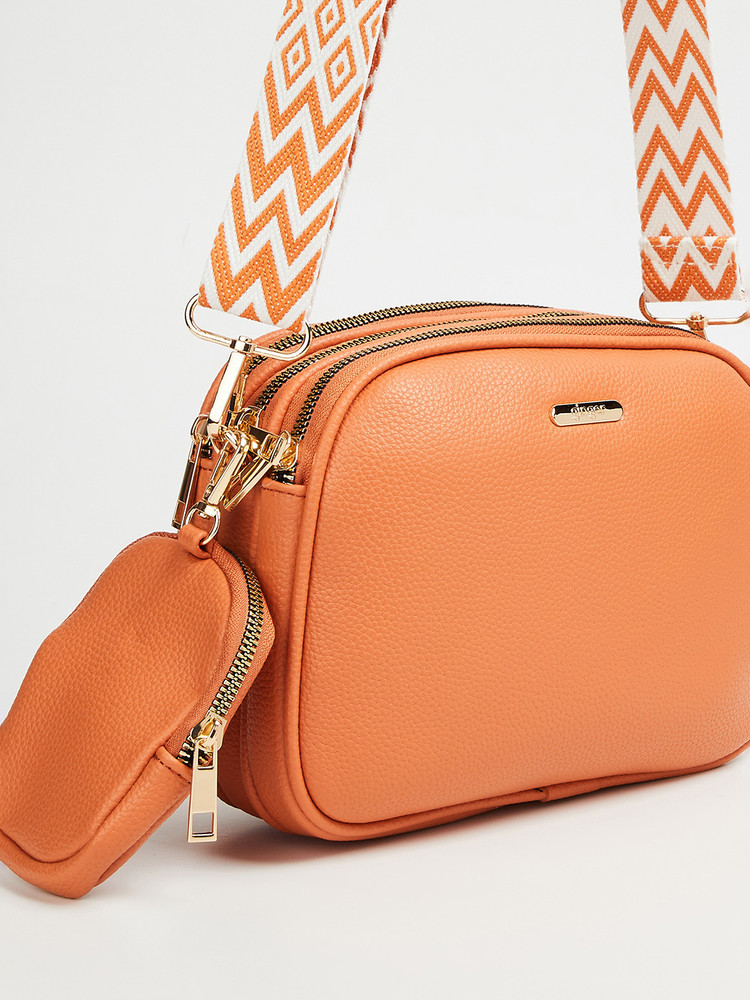 Ginger sling bags deals