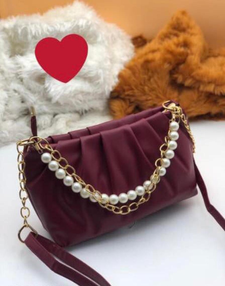 Maroon sling outlet bag