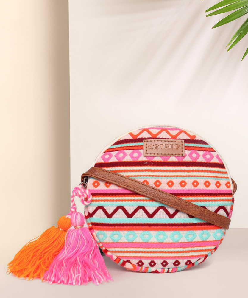 ASTRID Multicolor Sling Bag Round Sling Bag With Pompoms For Girls magnificent maroon Price in India Flipkart