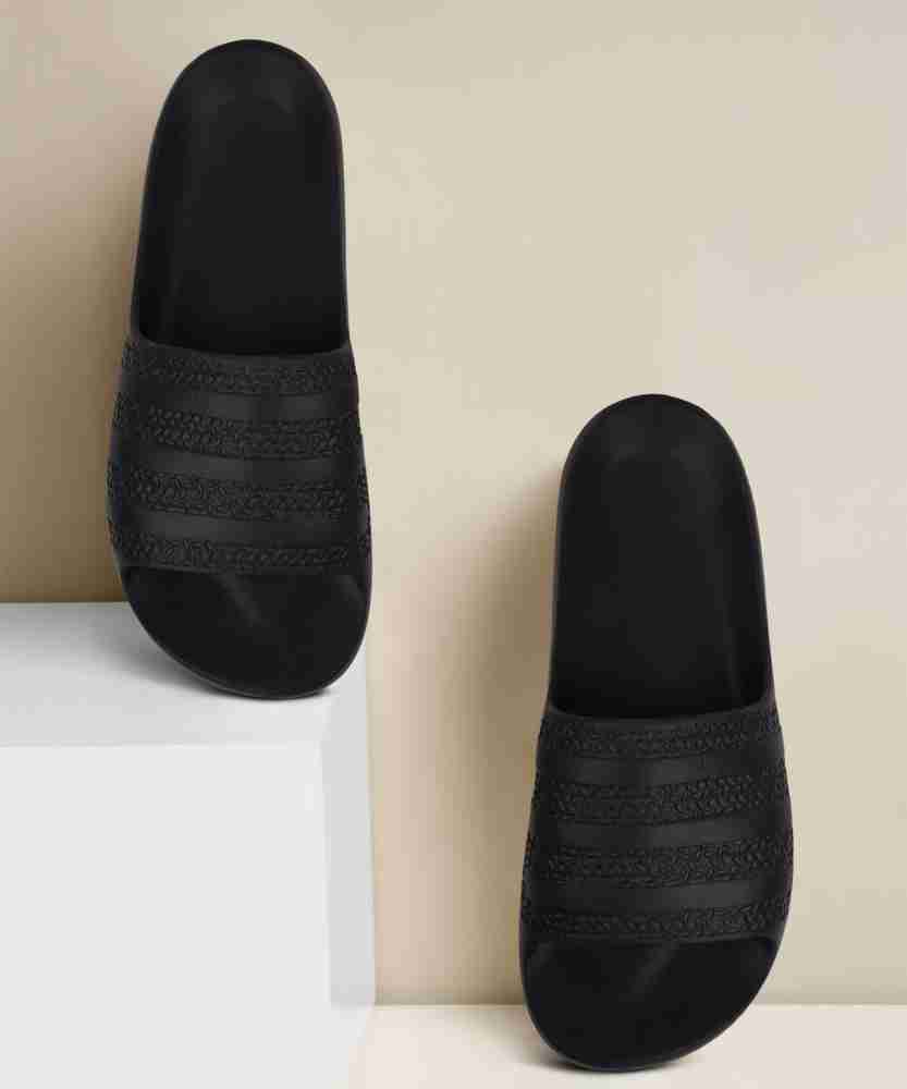 Softest adidas slides sales
