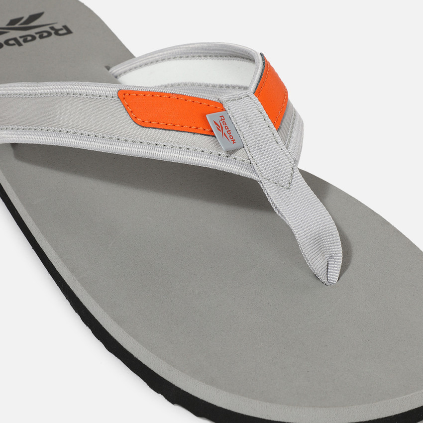 Reebok flip flops discount white