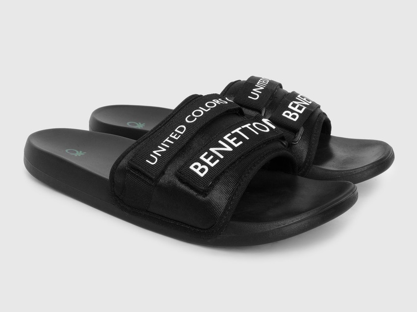 Ucb black best sale flip flops