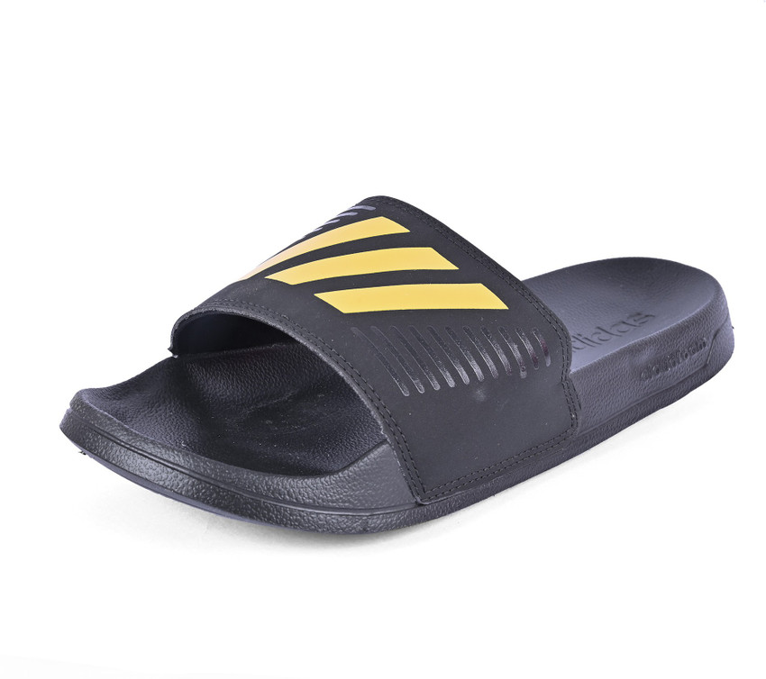 Adidas black 2025 and gold slides