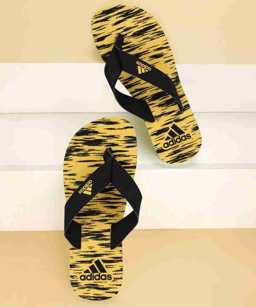 Yellow adidas 2025 flip flops