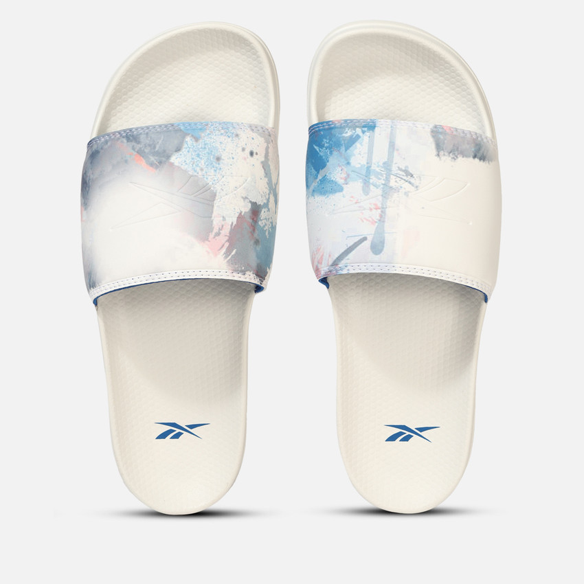 white reebok slides