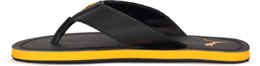 Puma black and cheap yellow slippers