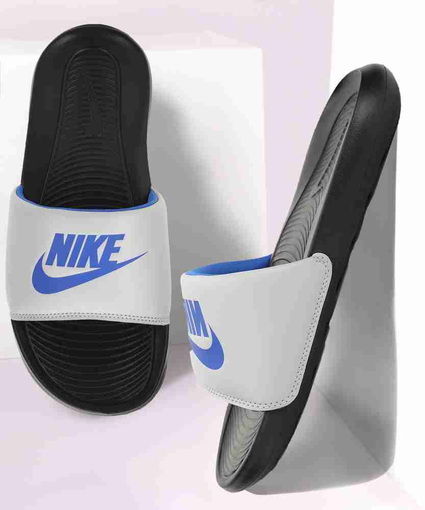 Blue and grey store nike slides