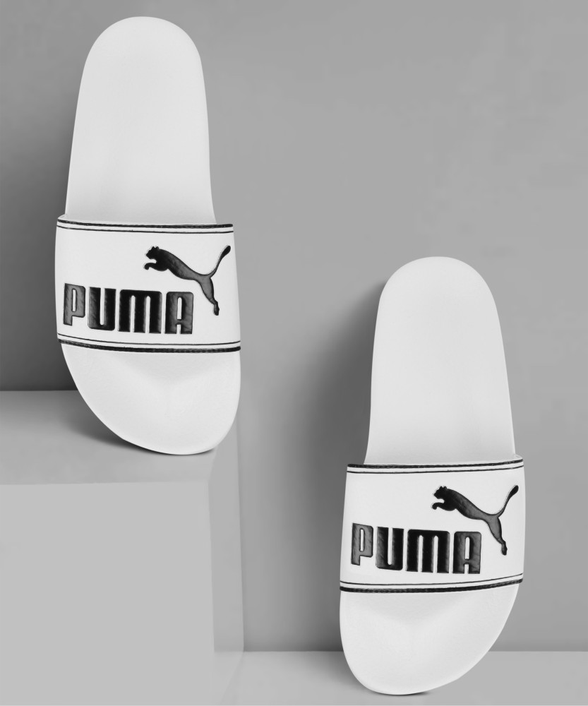 Black and white puma slides online