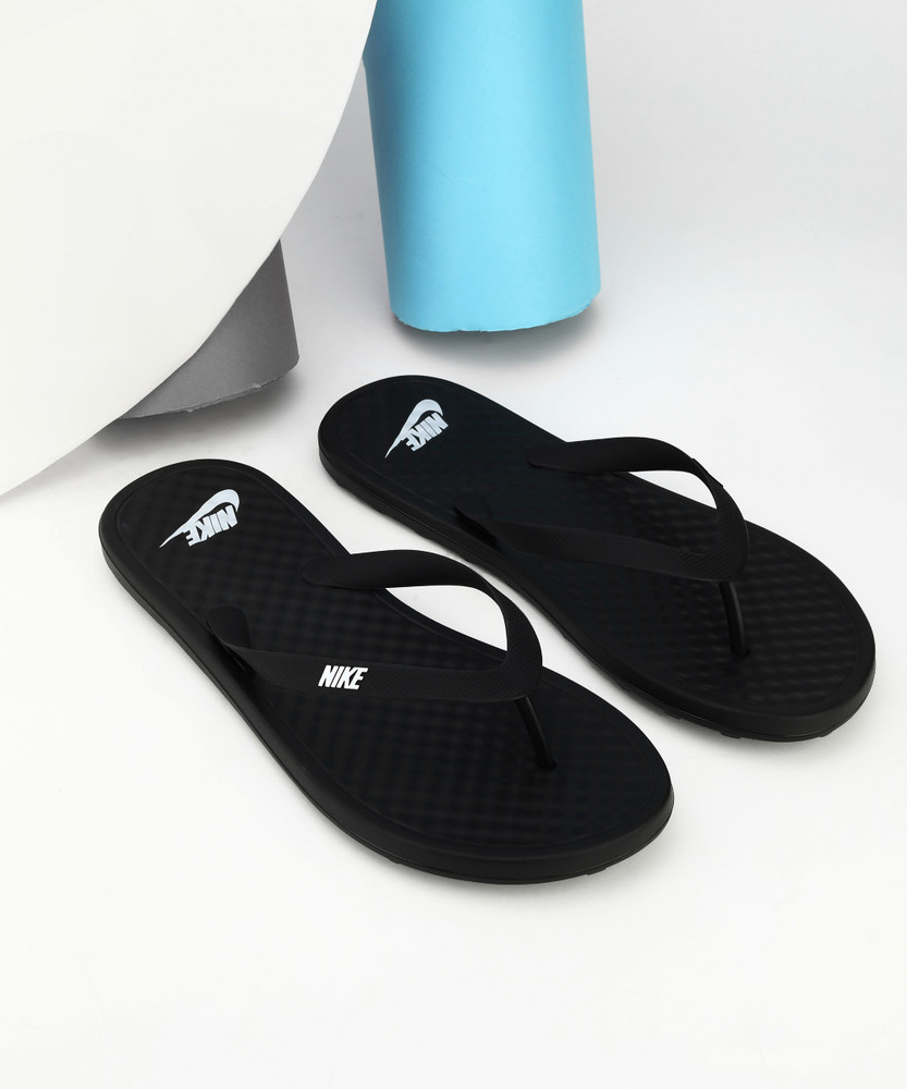 Nike slippers under 2 on sale