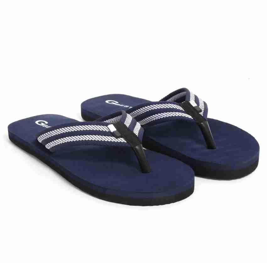 Reef navy blue online flip flops