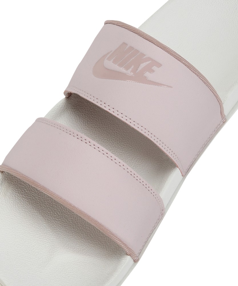 Pink nike slides online womens