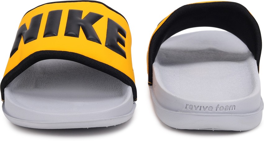 Yellow and black online nike slides