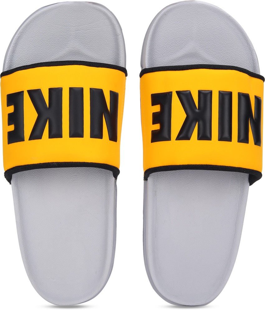 Nike on sale yellow slides