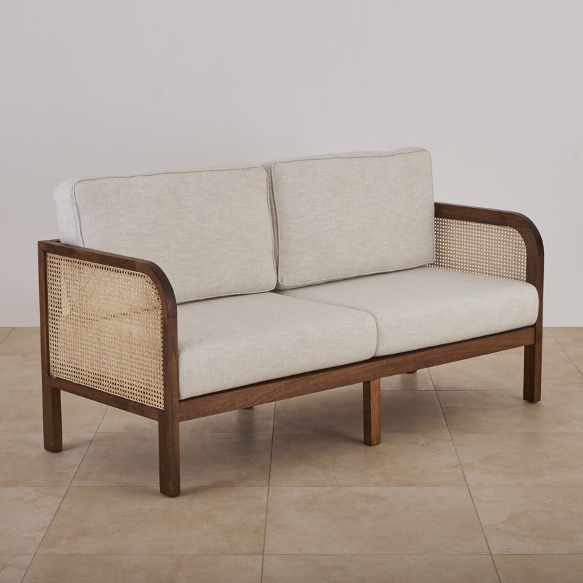 Two seater cane deals sofa