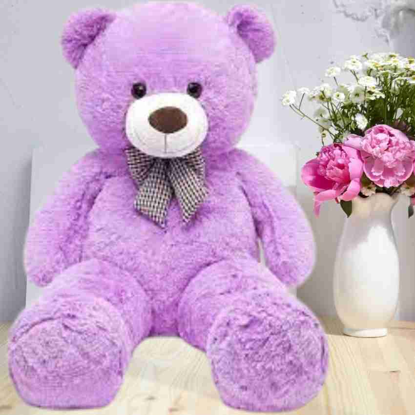 Purple teddy best sale bear with flowers