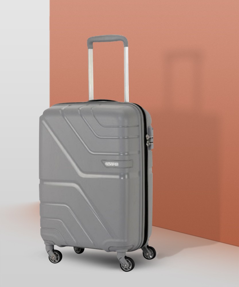 AMERICAN TOURISTER Upland Silver Trolley Bag AMT UPLAND SP 68 25 SILVER Cabin Suitcase 4 Wheels 22 inch Grey Price in India Flipkart