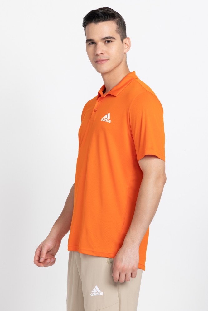 Orange adidas cheap golf shirt