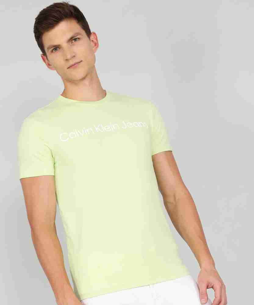 Calvin Klein Jeans Typography Men Round Neck Green T-Shirt - Buy Calvin  Klein Jeans Typography Men Round Neck Green T-Shirt Online at Best Prices  in India