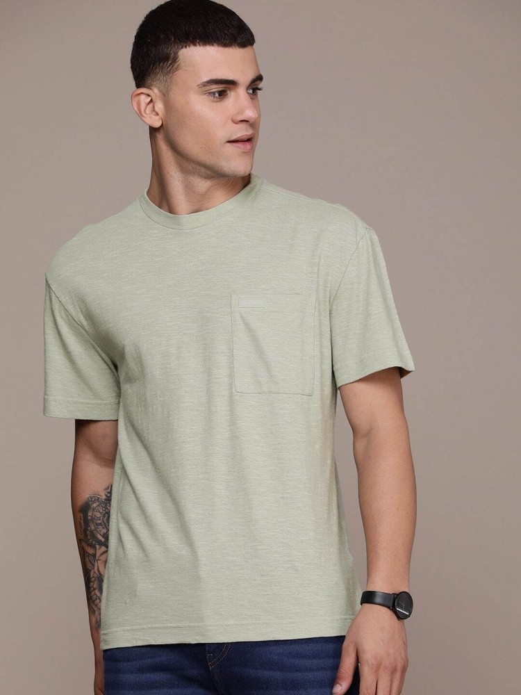 Calvin Klein Jeans Solid Men Round Neck Green T-Shirt - Buy Calvin Klein  Jeans Solid Men Round Neck Green T-Shirt Online at Best Prices in India