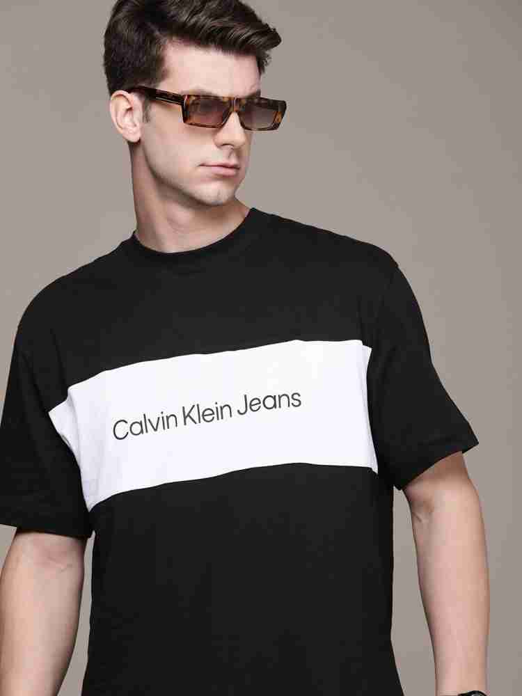 Calvin Klein Jeans Solid Men Crew Neck Black T-Shirt - Buy Calvin Klein  Jeans Solid Men Crew Neck Black T-Shirt Online at Best Prices in India