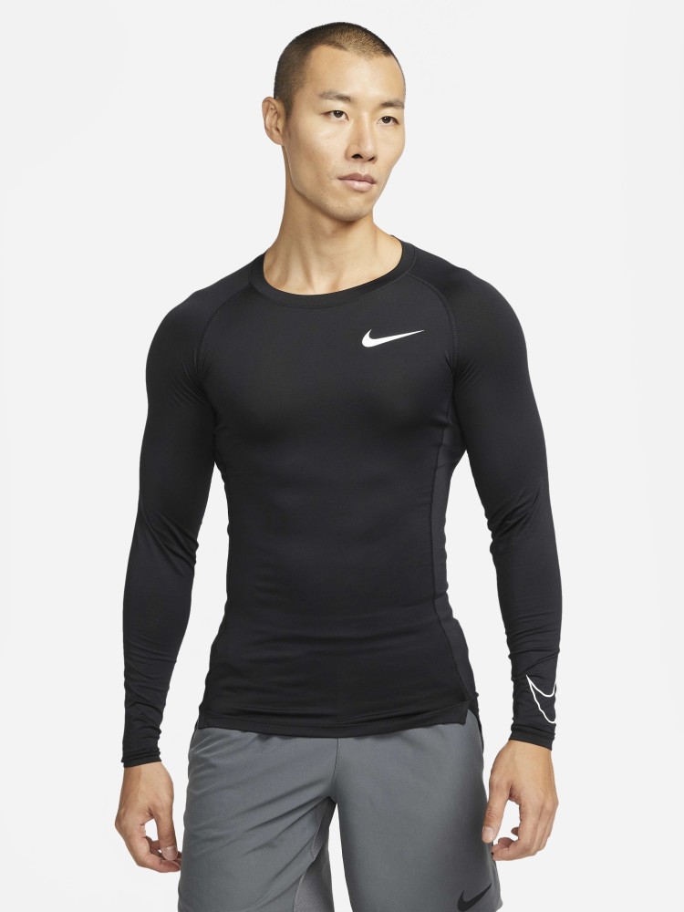 NIKE Solid Men Round Neck Black T Shirt