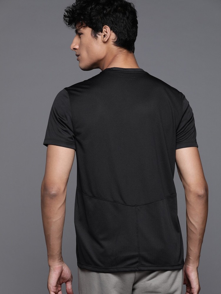 UNDER ARMOUR Solid Men Round Neck Black T-Shirt - Buy UNDER ARMOUR Solid  Men Round Neck Black T-Shirt Online at Best Prices in India