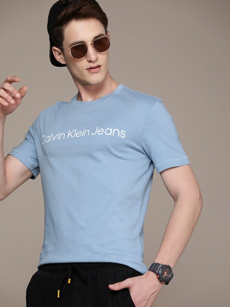 Calvin klein light blue hotsell t shirt