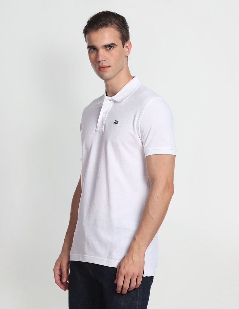 Arrow Sport Solid Men Polo Neck White T Shirt Buy Arrow Sport