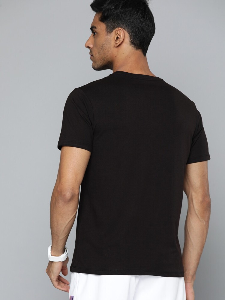 HRX by Hrithik Roshan Solid Men Round Neck Black T-Shirt - Buy HRX