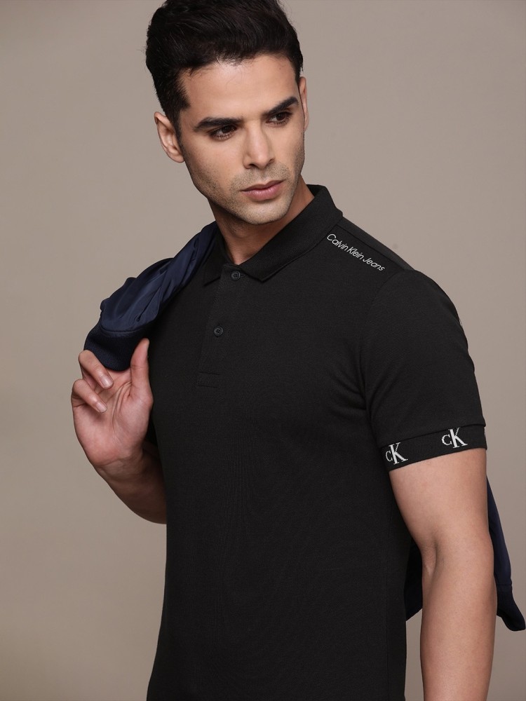 Calvin Klein Jeans Solid Men Polo Neck Black T Shirt Buy Calvin Klein Jeans Solid Men Polo Neck Black T Shirt Online at Best Prices in India Flipkart