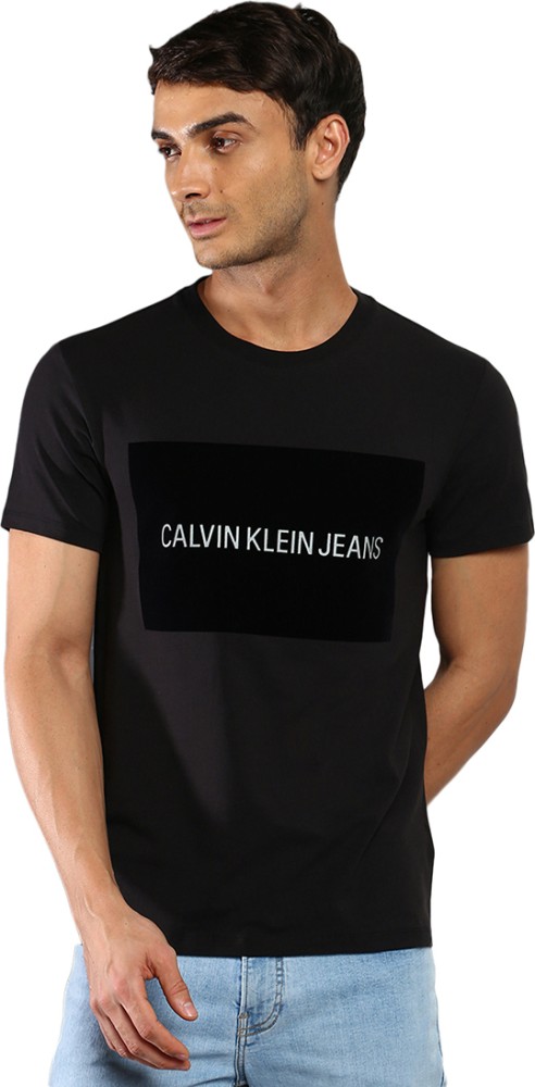 Calvin Klein Jeans Solid Men Crew Neck Black T-Shirt - Buy Calvin Klein  Jeans Solid Men Crew Neck Black T-Shirt Online at Best Prices in India