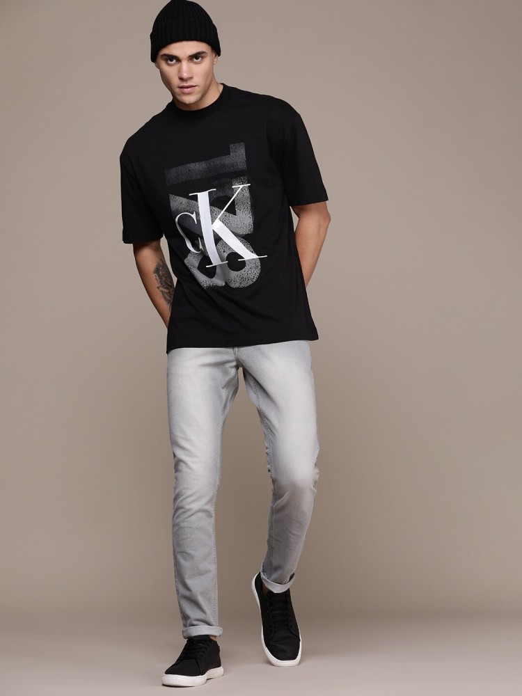 Calvin Klein Jeans Solid Men Crew Neck Black T-Shirt - Buy Calvin