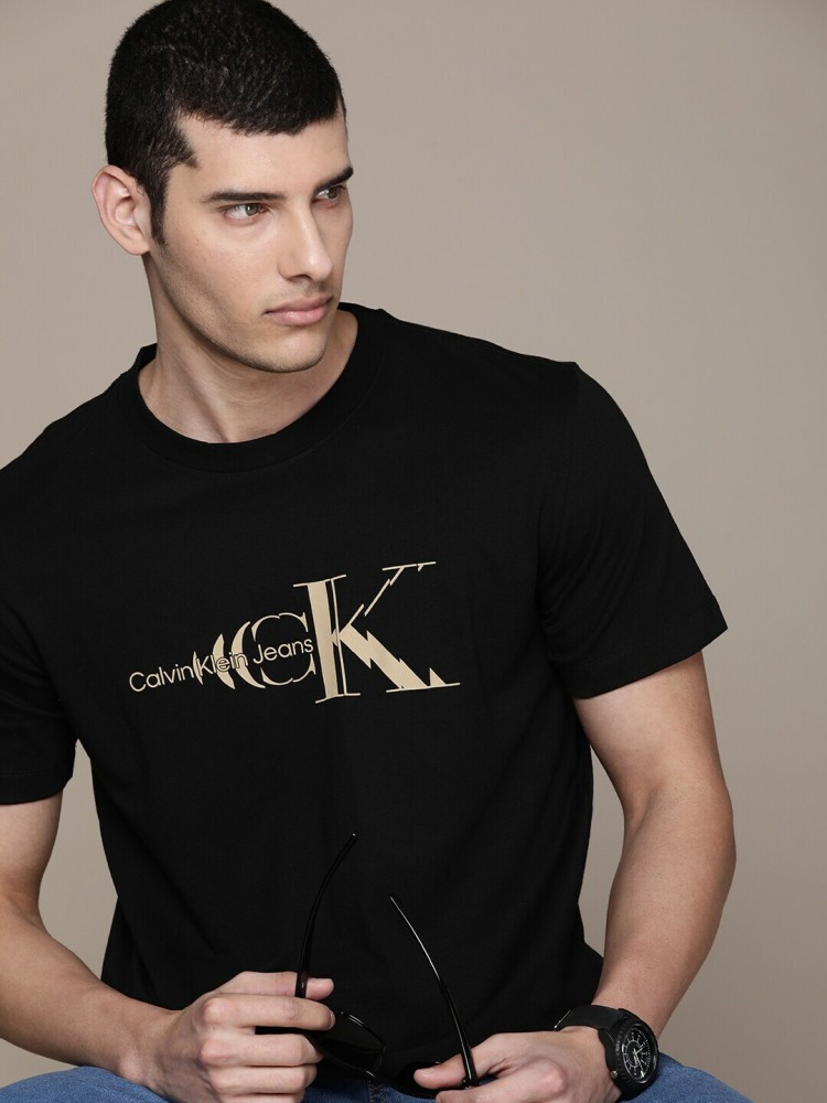 Calvin Klein Jeans Solid Men Crew Neck Black T-Shirt - Buy Calvin Klein  Jeans Solid Men Crew Neck Black T-Shirt Online at Best Prices in India