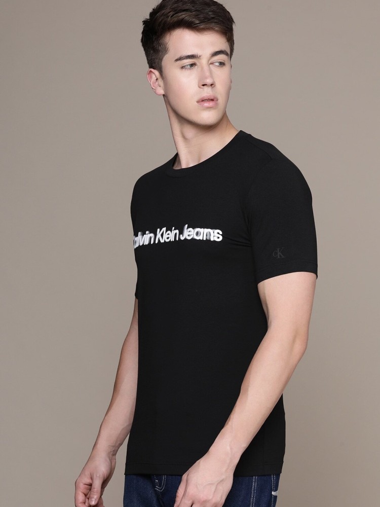 Calvin Klein Jeans Typography Men Round Neck Black T-Shirt - Buy Calvin  Klein Jeans Typography Men Round Neck Black T-Shirt Online at Best Prices  in India