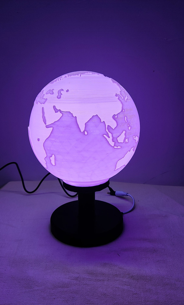 Color changing outlet earth light