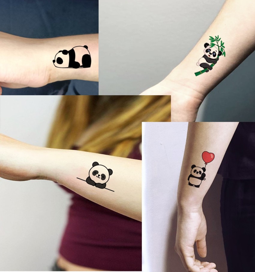 Tiny Outlined Polar Bear Tattoo On Wrist