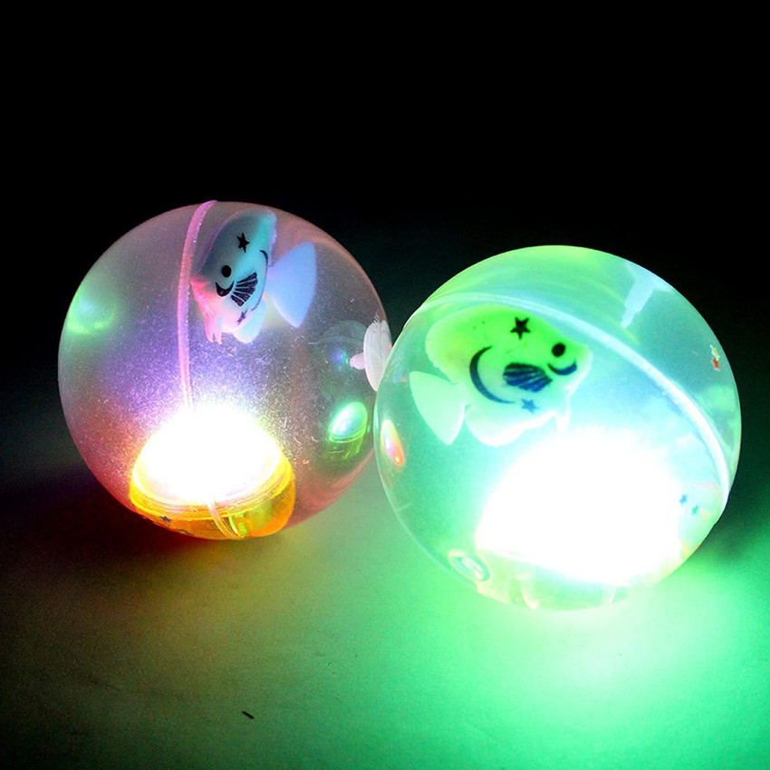 Bouncy glitter ball with clearance flashing light