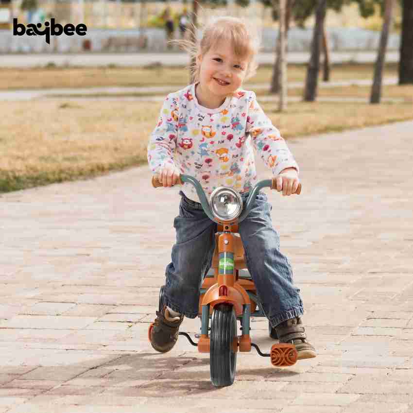 Boy clearance riding tricycle