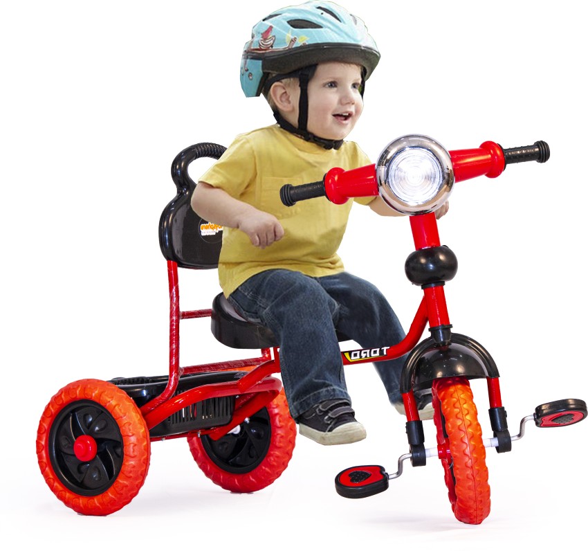 At what age can a child pedal best sale a tricycle