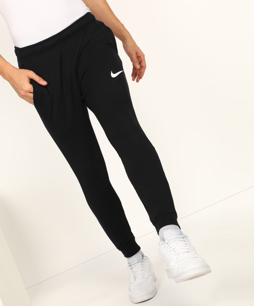 Nike Sportswear TRND PANT - Tracksuit bottoms - black/white/black -  Zalando.de