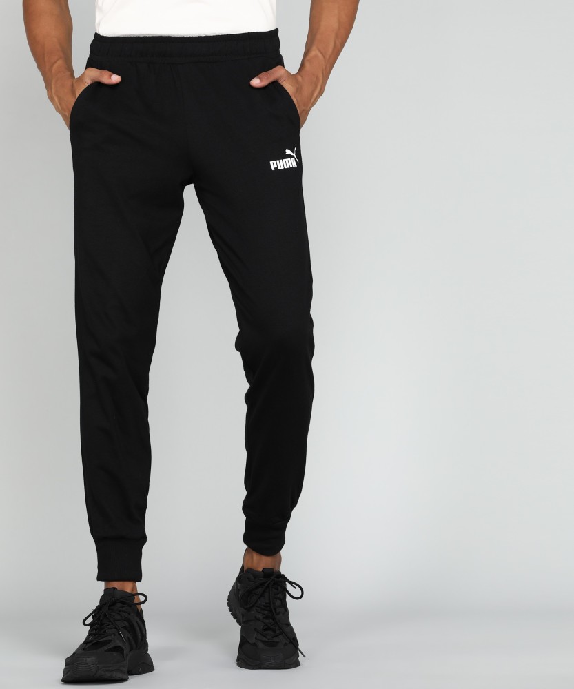 PUMA ESS+ Jersey Pants cl Solid Men Black Track Pants - Buy PUMA