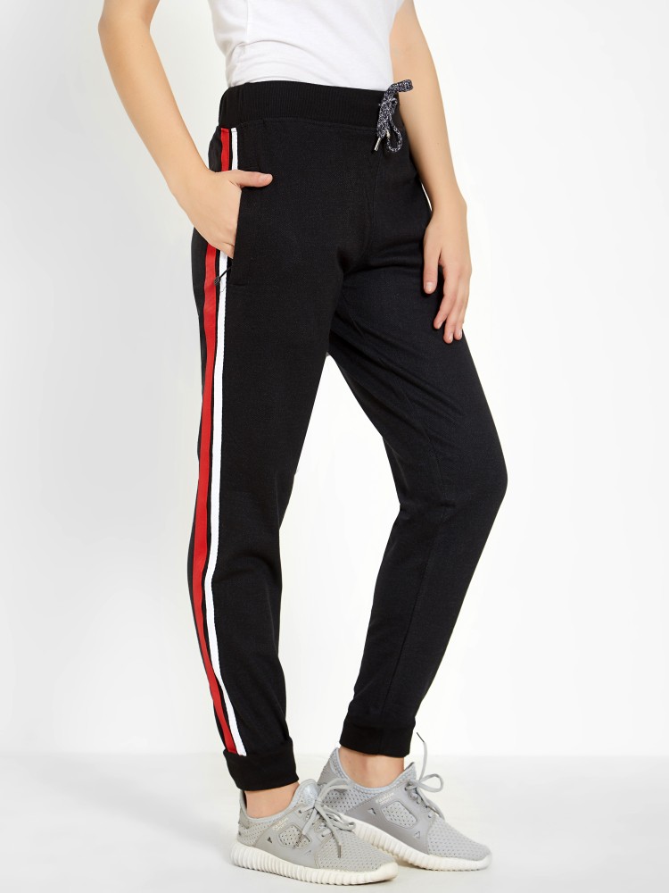 Black track pants with 2024 red and white stripe