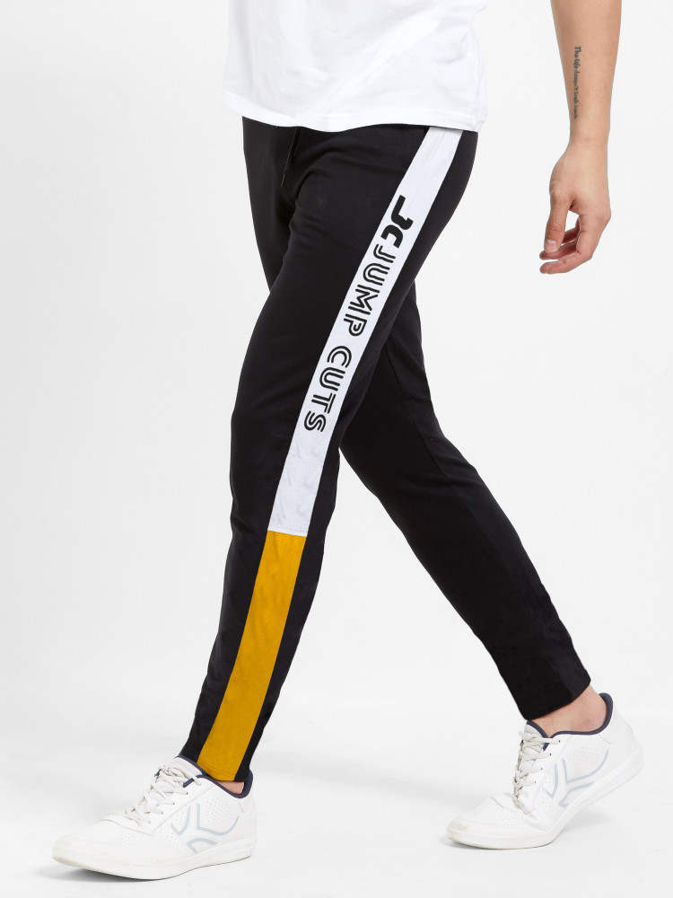 Yellow black and white track pants cheap