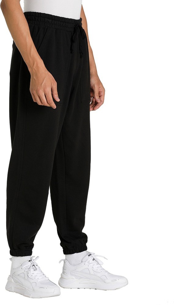 PUMA Downtown Sweatpants Solid Men Black Track Pants - Buy PUMA Downtown  Sweatpants Solid Men Black Track Pants Online at Best Prices in India