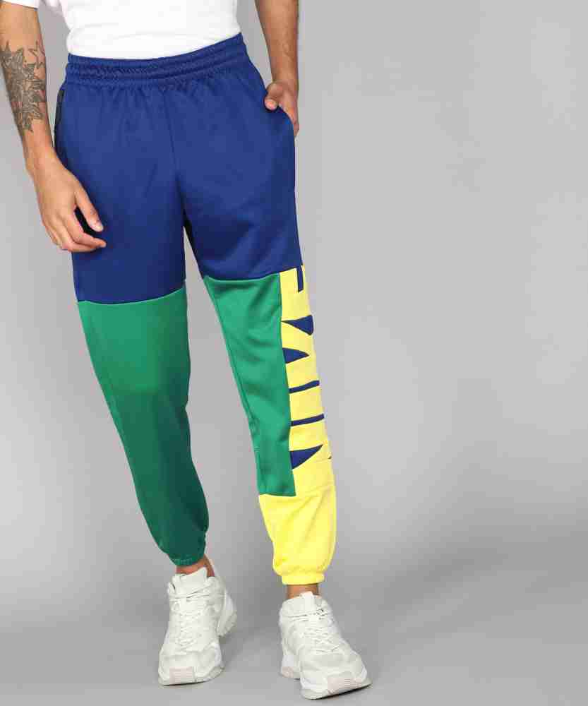 Nike track cheap pants yellow