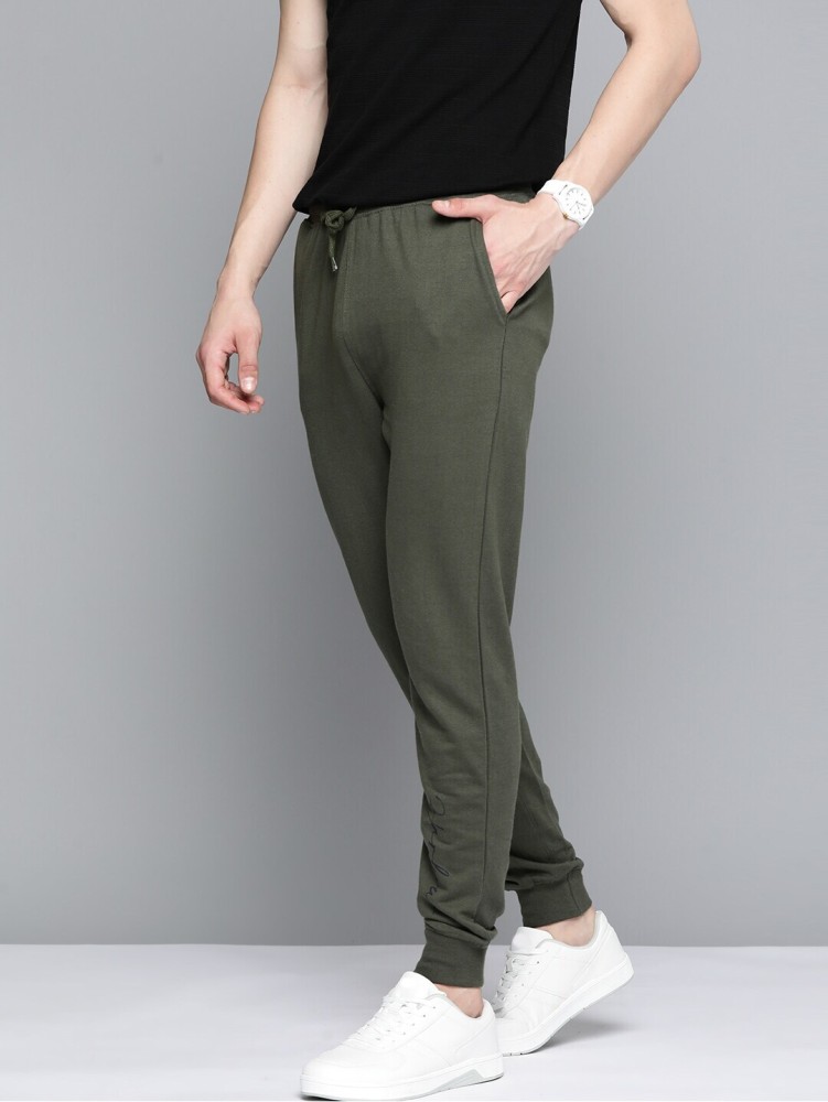 Mast & Harbour Solid Men Green Track Pants - Buy Mast & Harbour