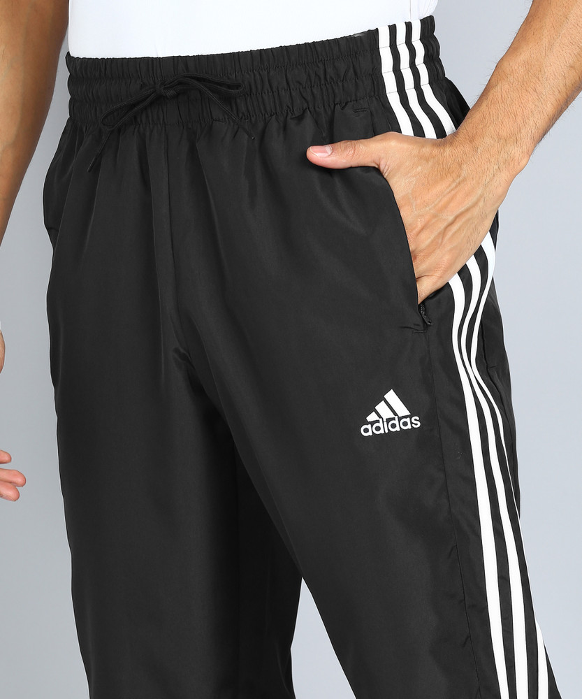 Adidas full best sale stripe pants