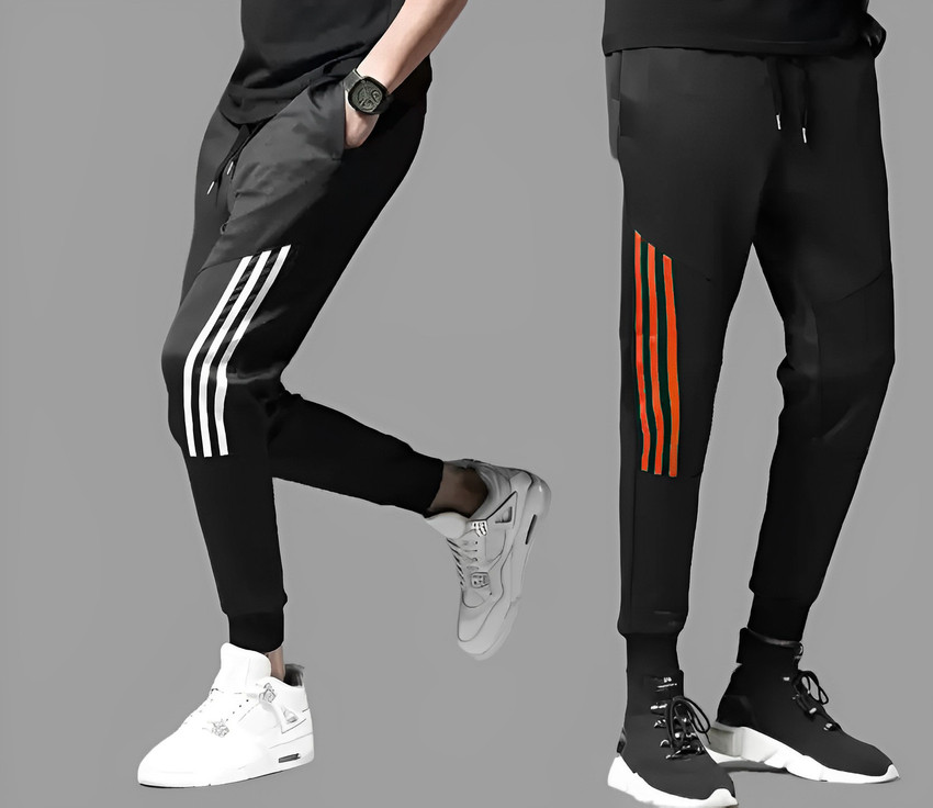 grey and orange adidas track pants