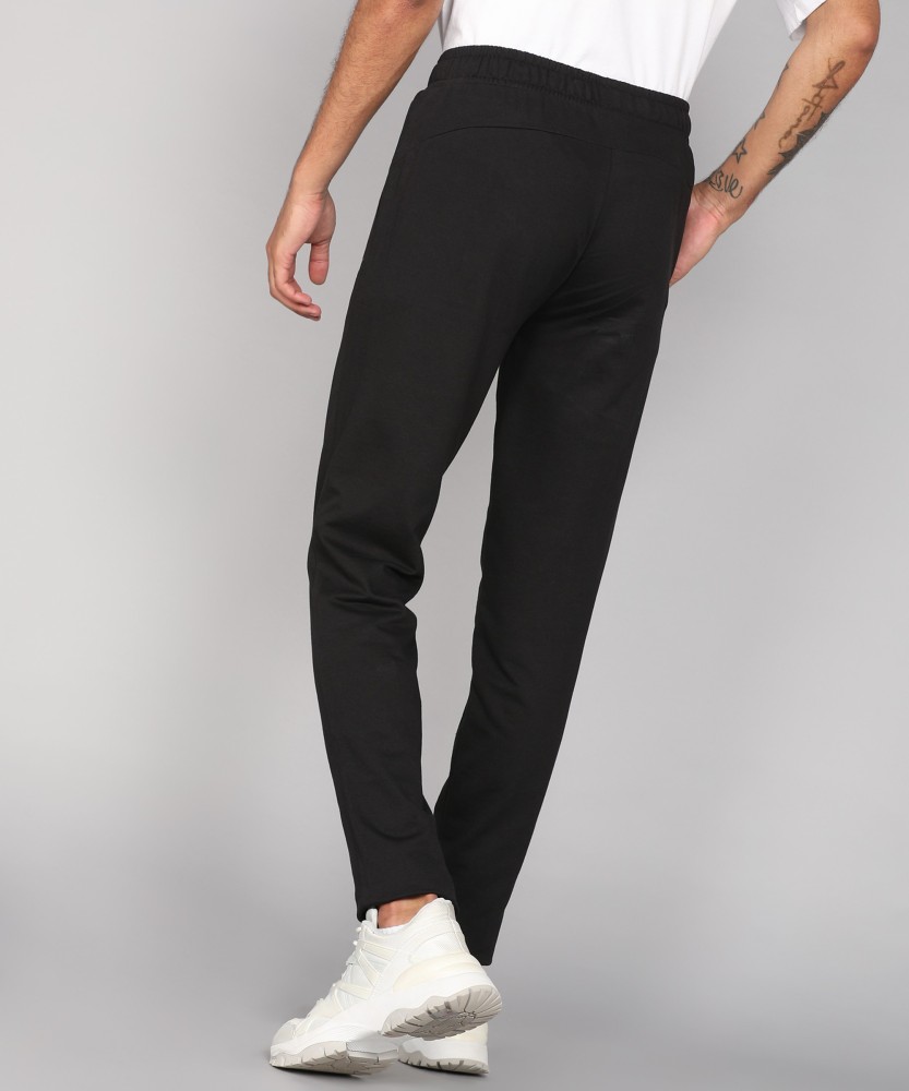 PUMA Pants Solid Men Black Track Pants - Buy PUMA Pants Solid Men Black  Track Pants Online at Best Prices in India